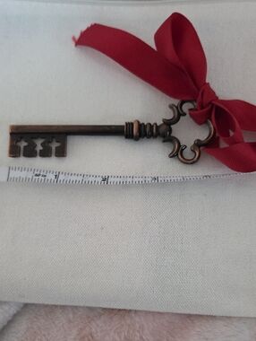 Antique-Style Decorative Skeleton Key with Red Ribbon